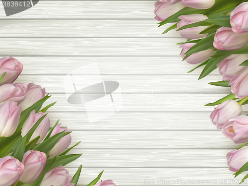 Image of Pink tulips on wooden background. EPS 10