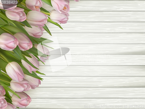 Image of Pink flowers tulips on the light wooden. EPS 10