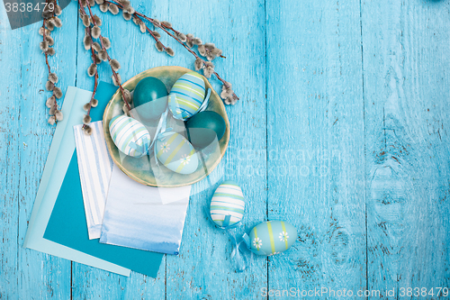 Image of Easter eggs on wooden background