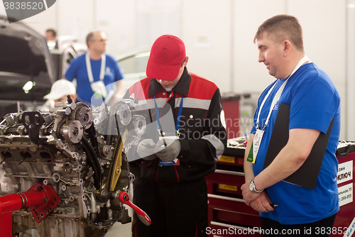 Image of Young car mechanic passes competition stage.Tyumen