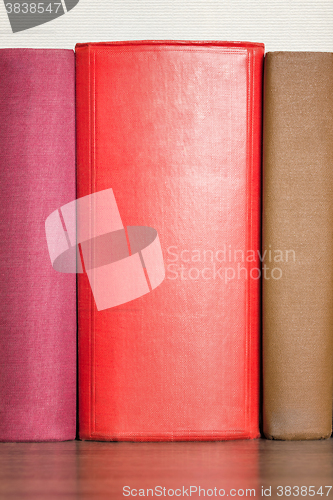 Image of stack of books on the shelf