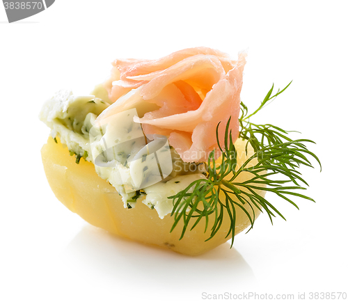 Image of boiled potato decorated with dill and garlic butter and salmon