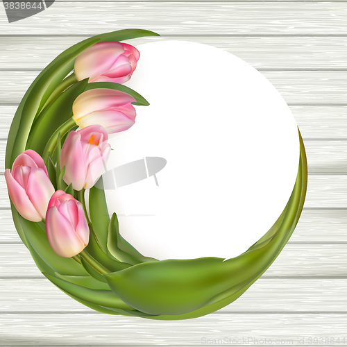 Image of Tulips over wooden table background. EPS 10