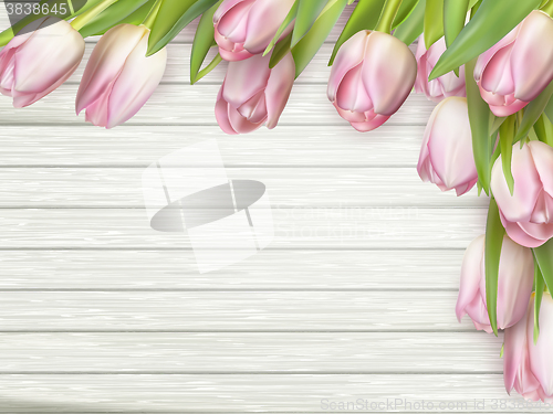 Image of Pink tulips on wooden background. EPS 10