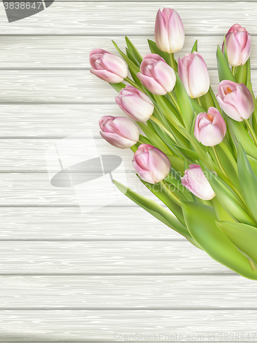Image of Pink Tulips over wooden table. EPS 10