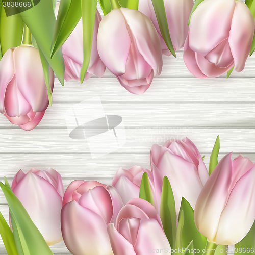 Image of Beautiful pink tulips on wooden background. EPS 10