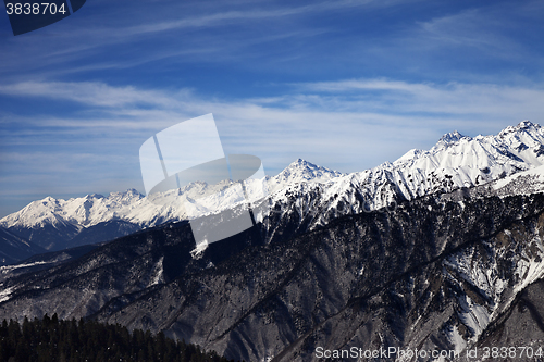 Image of View on mountains in sun windy day
