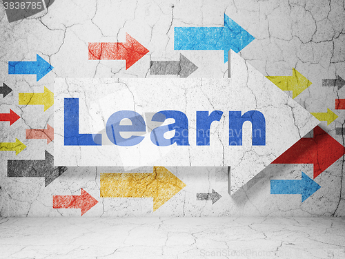 Image of Education concept: arrow with Learn on grunge wall background