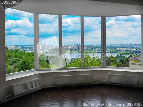 Image of window with a view of Kyiv in spring