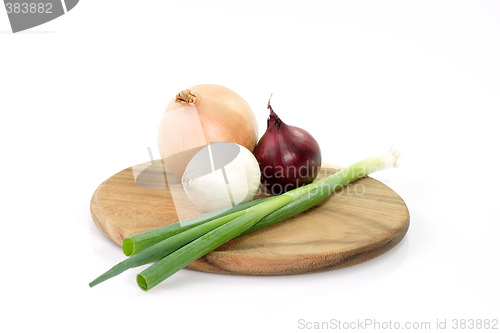 Image of Onions on a wooden board