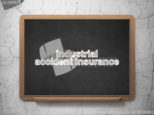 Image of Insurance concept: Industrial Accident Insurance on chalkboard background