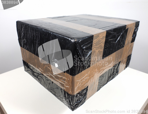 Image of Black packet parcel