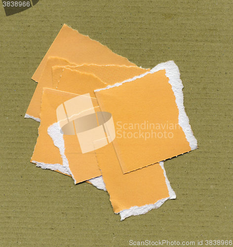 Image of Yellow Torn paper pieces