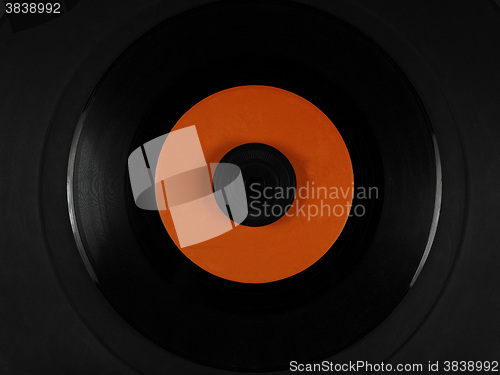 Image of Vinyl on a phonograph rubber platter mat