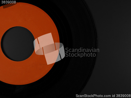 Image of Vinyl on a phonograph rubber platter mat