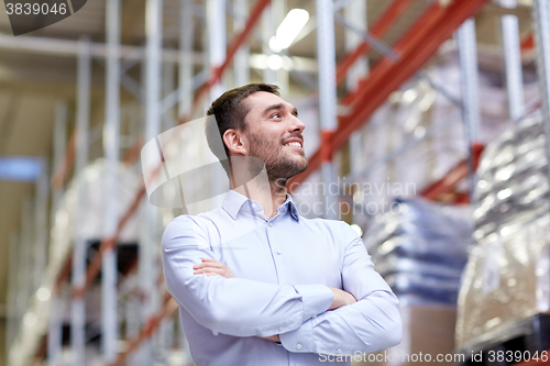 Image of happy man at warehouse