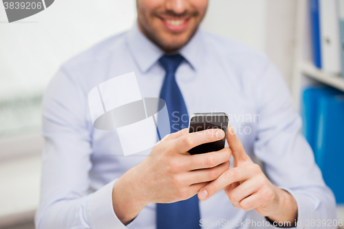 Image of close up of businessman with smartphone