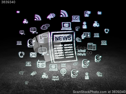 Image of News concept: Newspaper in grunge dark room