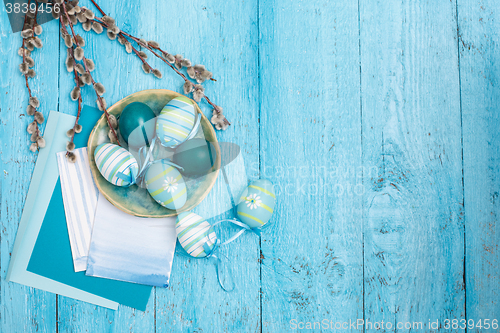 Image of Easter eggs on wooden background