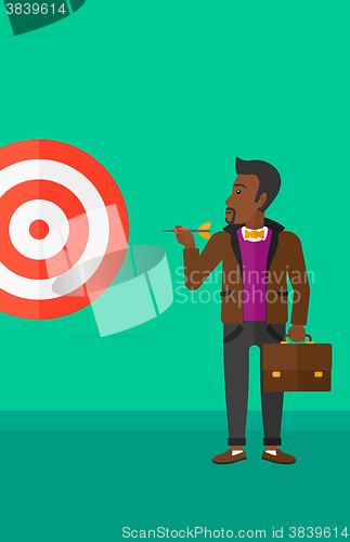 Image of Businessman with target board.