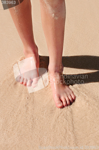 Image of Feet on sandy beach