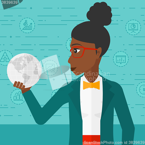 Image of Woman holding globe.