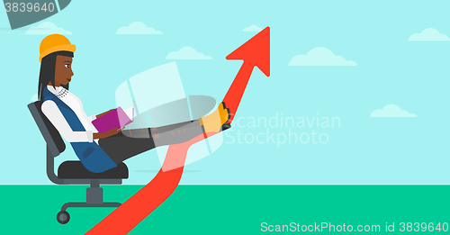 Image of Business woman reading book.