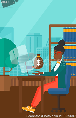 Image of Business woman working in office.