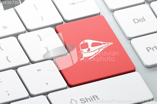 Image of Tourism concept: Train on computer keyboard background