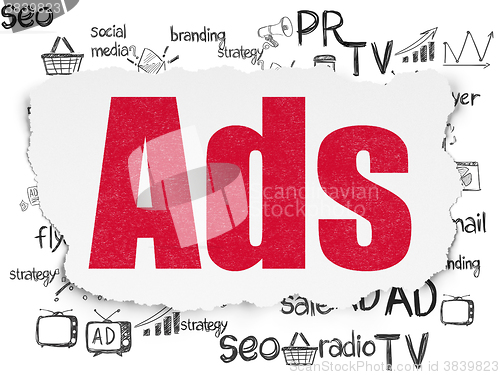 Image of Advertising concept: Ads on Torn Paper background