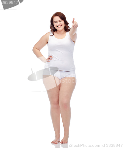 Image of plus size woman in underwear showing thumbs up