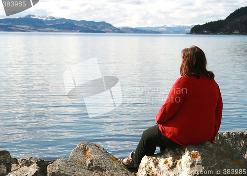 Image of Woman by the ocean