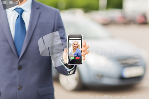 Image of close up of business man with smartphone call