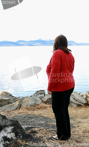 Image of Woman by the ocean