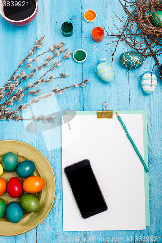 Image of The top view of easter on wooden table office workplace