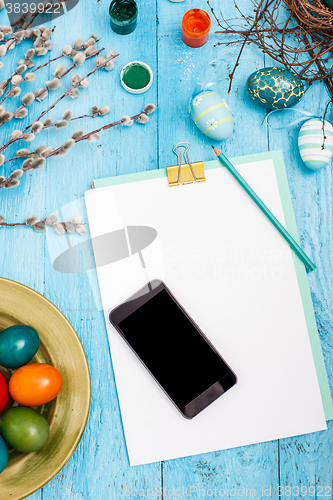 Image of The top view of easter on wooden table office workplace