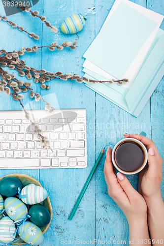 Image of The top view of easter on wooden table office workplace