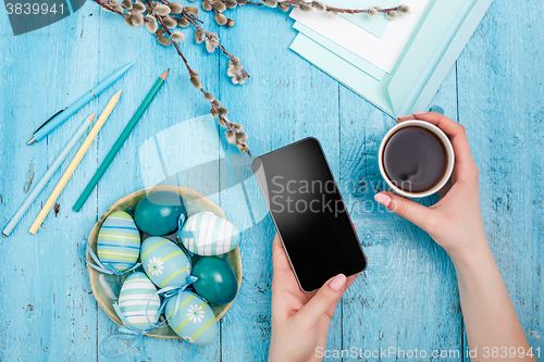 Image of The top view of easter on wooden table office workplace