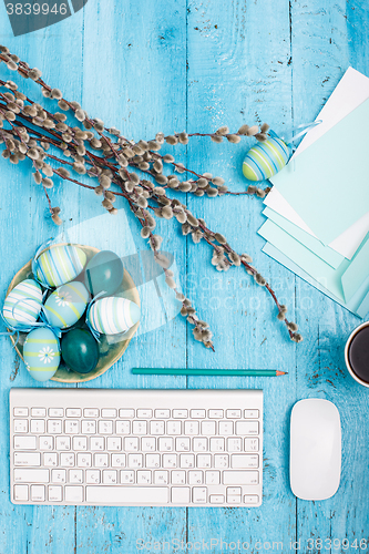 Image of The top view of easter on wooden table office workplace