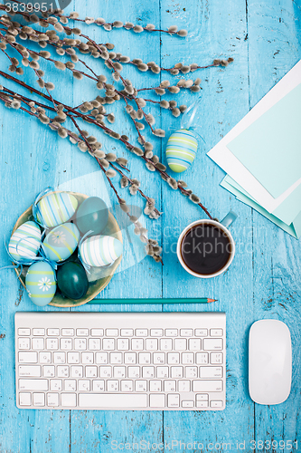 Image of The top view of easter on wooden table office workplace