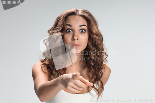 Image of The happy woman on gray background