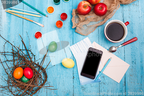 Image of The top view of easter on wooden table office workplace