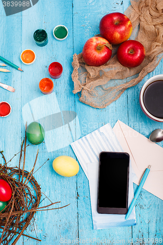 Image of The top view of easter on wooden table office workplace