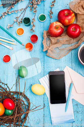 Image of The top view of easter on wooden table office workplace