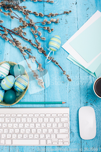 Image of The top view of easter on wooden table office workplace