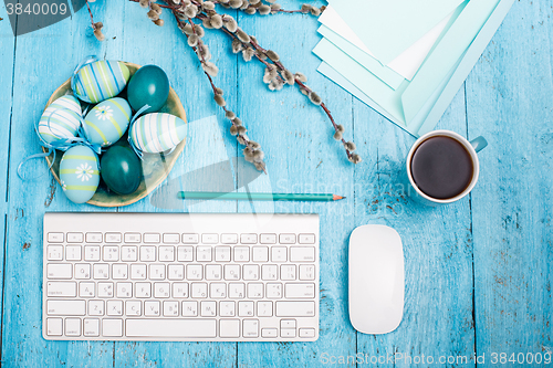 Image of The top view of easter on wooden table office workplace