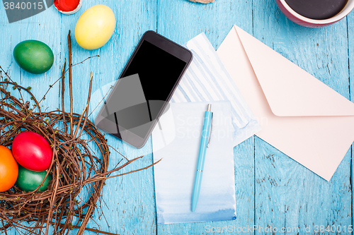 Image of The top view of easter on wooden table office workplace