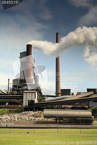 Image of Active steel mill smelter emiting billowing toxic fumes