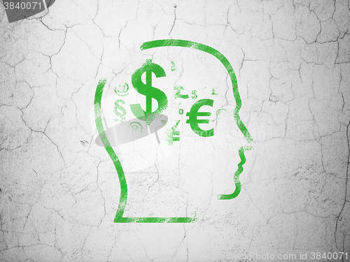 Image of Advertising concept: Head With Finance Symbol on wall background