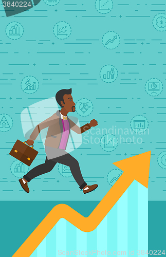 Image of Man running on growth graph. 